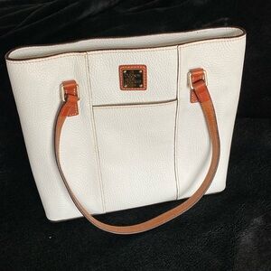White leather handbag made by Dooney & Burke